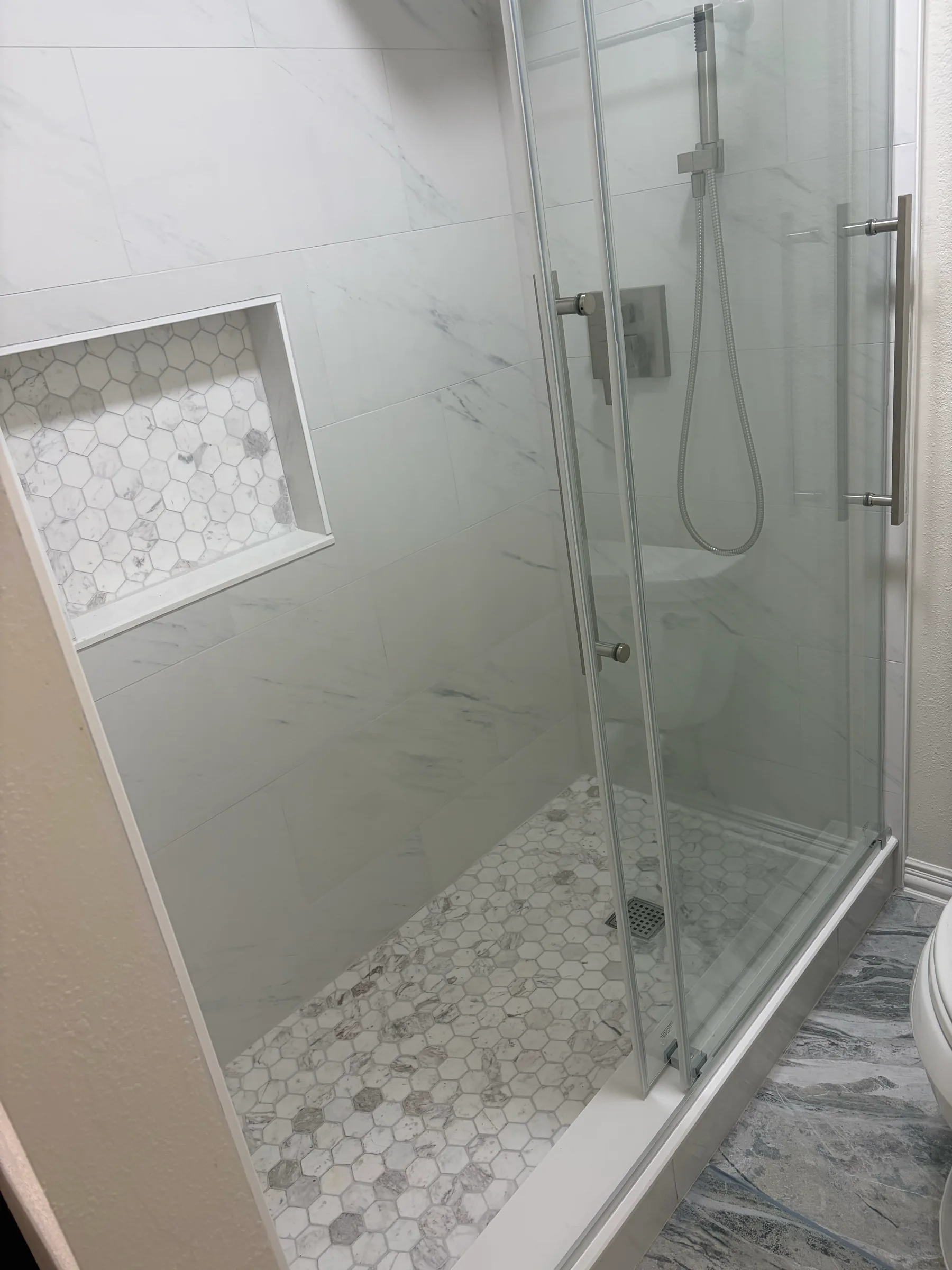 Completed bathroom and shower remodeling work