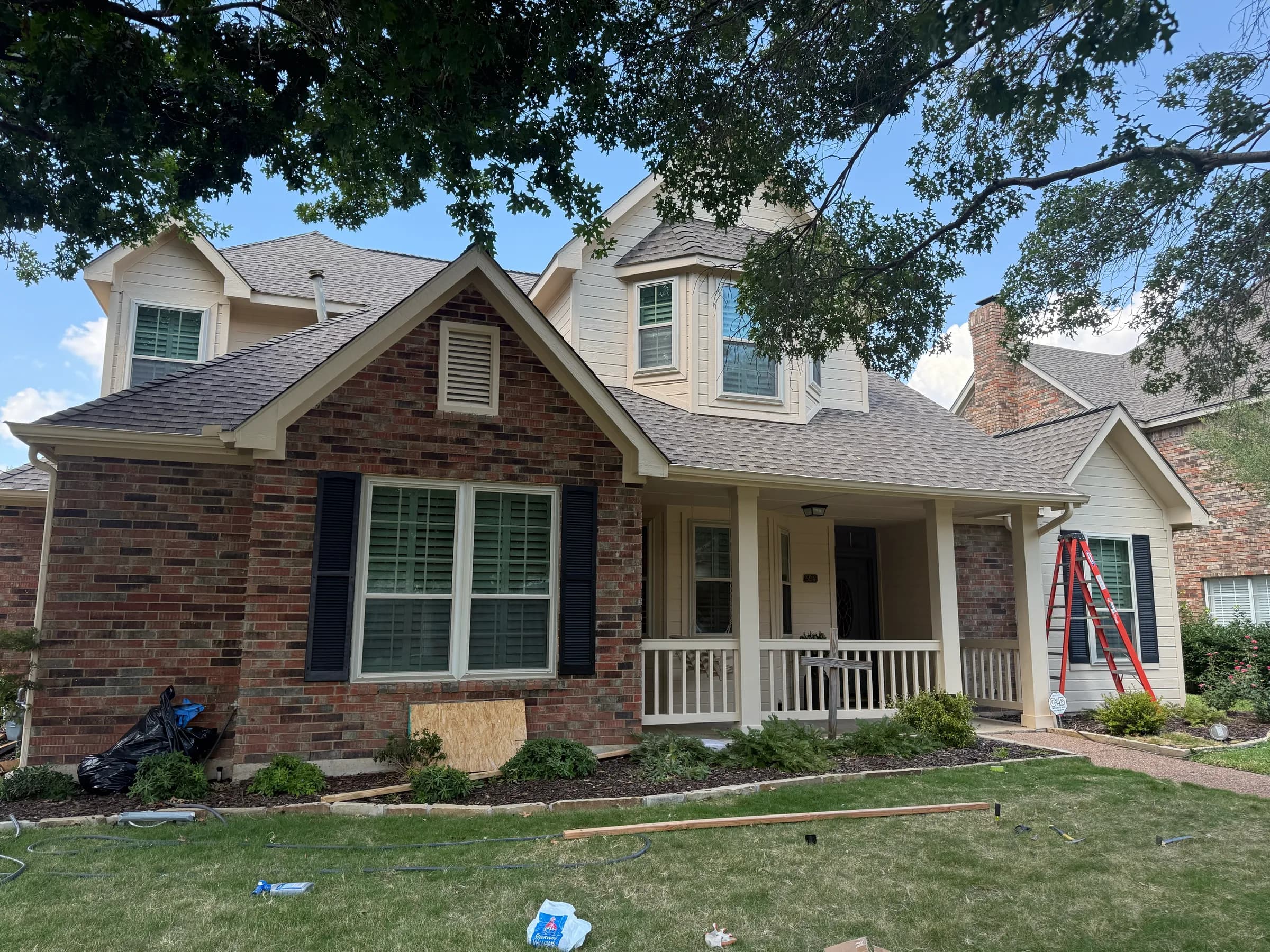 Completed exterior masonry and roofing work