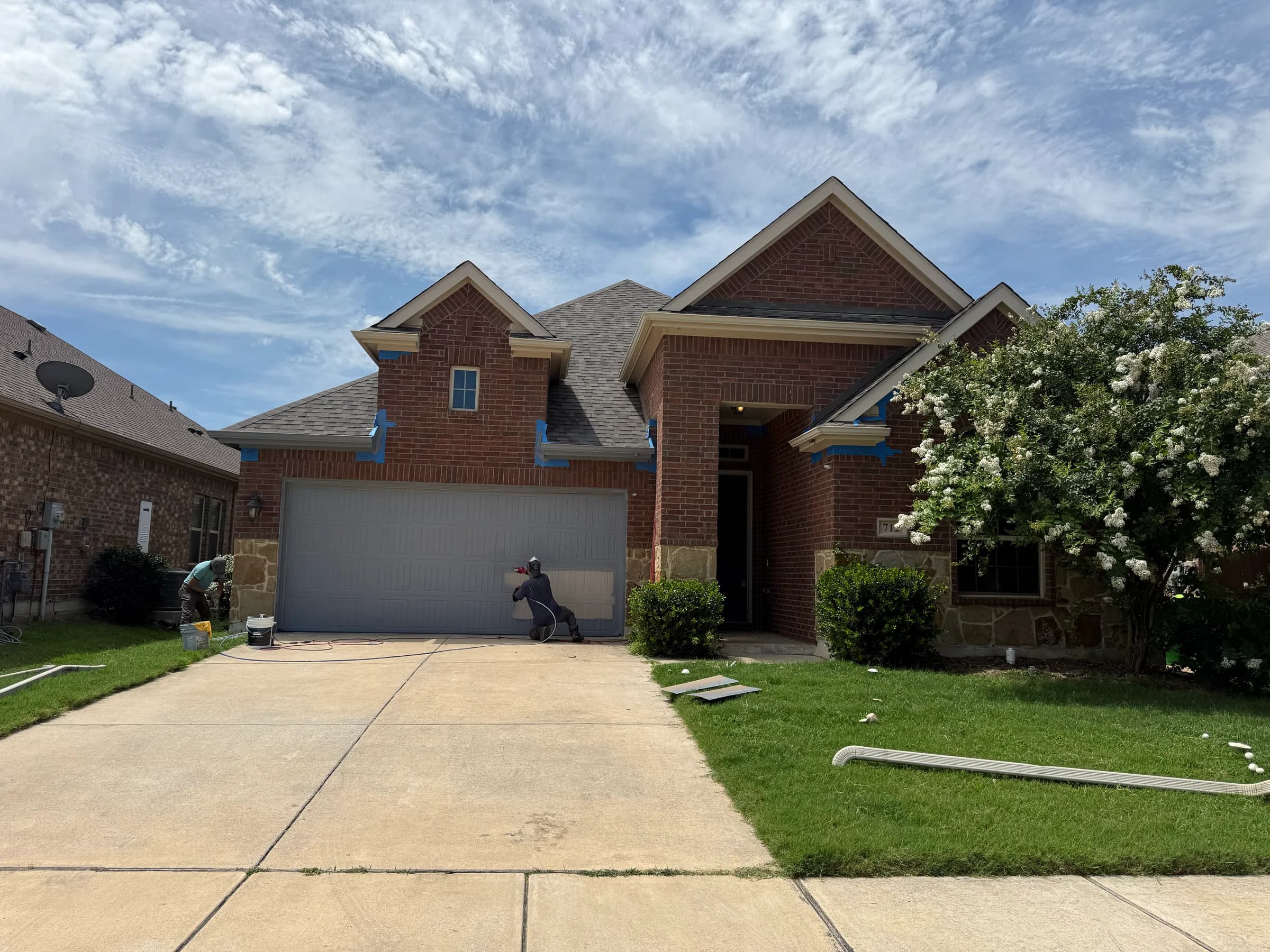 Completed exterior masonry and roofing work